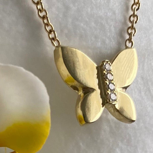 The JJ butterfly necklace made by hand in solid 18k gold and brilliant diamonds. www.paulinajewelry.com