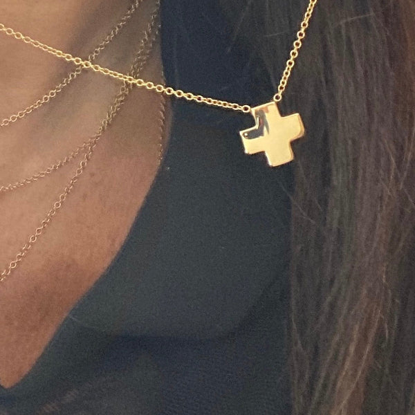 Cross crafted by hand in solid gold and Italian gold chains