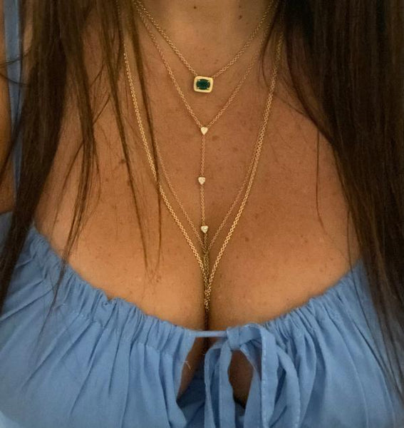 The Emerald necklace is crafted  by hand in solid 18K gold, 18K solid Italian gold chains and Emerald Stone. Made by hand in USA www.paulinajewelry.com