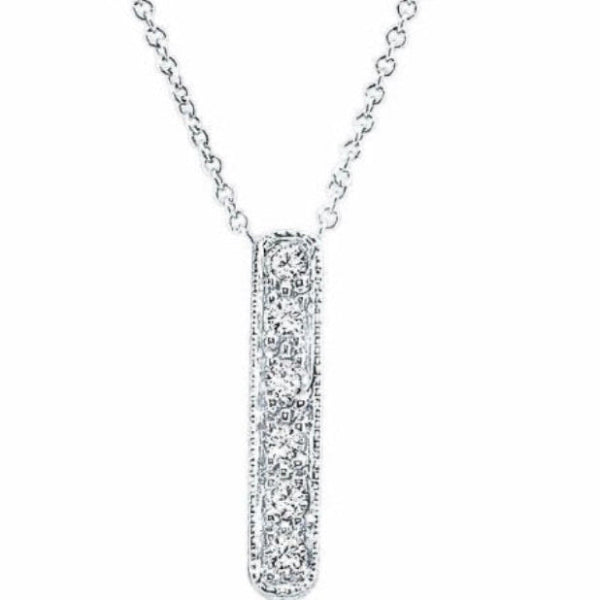 crafted by hand in solid 18K gold, Italian gold chains and hand set diamonds