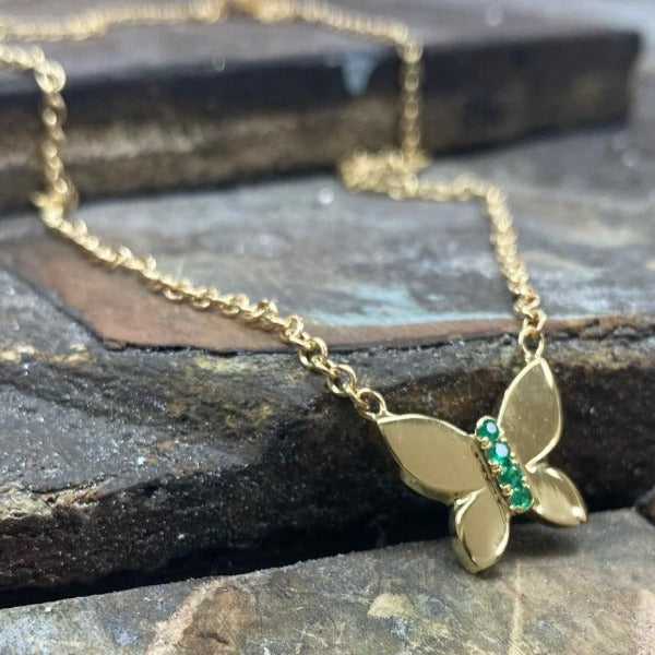 The JJ butterfly necklace in solid 18K gold and emerald stones  www.paulinajewelry.com