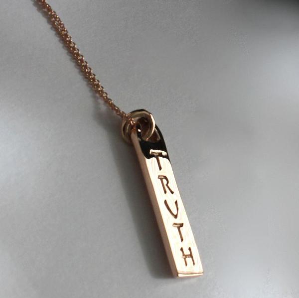 The Corinne ID tag necklaces made by hand in solid 18K gold and 18K Italian gold chains. Available in rose, yellow and white gold. Made by hand in USA.