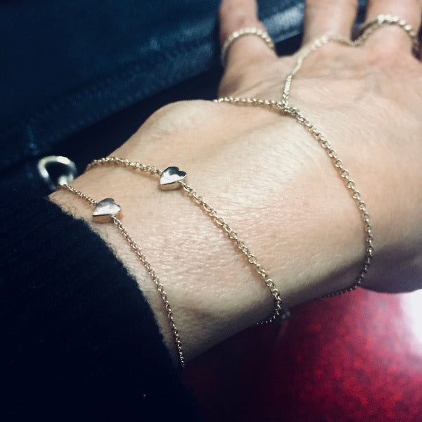 heart bracelets in gold by paulina jewelry