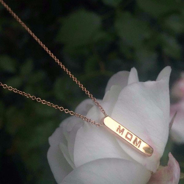 The Beth double sided necklaces are made by hand in solid 14k gold and Italian gold chains. These dainty necklaces have one word on one side and another on the other side. Made by hand in USA. Also available as a bracelet and in sterling silver. www.paulinajewelry.com