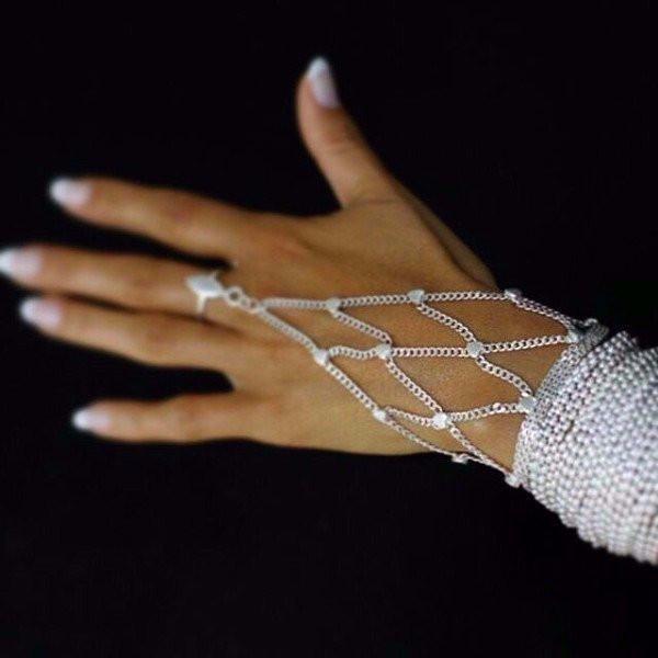 The Paulina ring bracelet is made by hand in solid sterling silver and Italian sterling silver chains. The ring is adjustable. Made by hand in USA. Expected shipping 10-14 business days