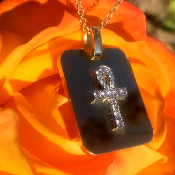 These stunning J-R dog tags with ankhs are made by hand in solid 18K gold, Italian gold chains and brilliant diamonds. Available in solid rose, yellow and white gold. Made by hand and to order in USA. www.paulinajewelry.com