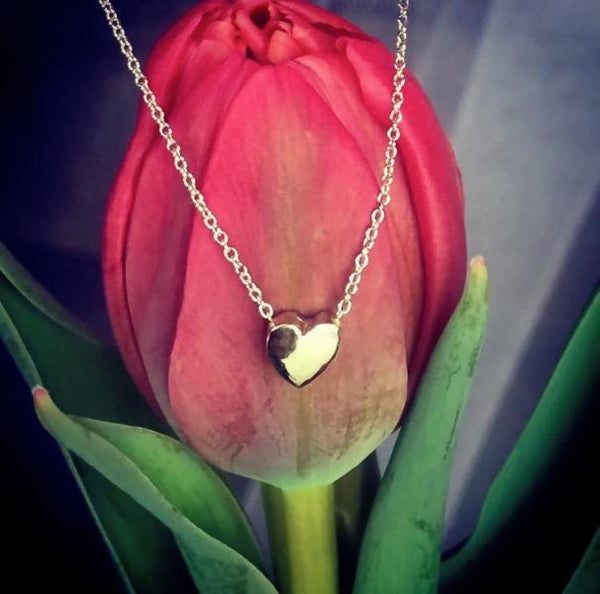 jewelry that feels good, made by hand in USA... dainty heart necklaces made by hand in solid sterling silver and Italian sterling silver chains
