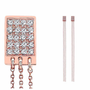 The Justine diamond earrings by Paulina jewelry.  Made by hand in solid 18K gold, diamonds and 18K Italian gold chains. Available in solid 18K white, yellow and rose gold.