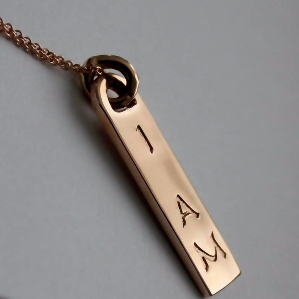 The Corinne ID tag necklaces are made by hand in solid 14k gold and Italian gold chains. Available in solid rose, yellow and white gold. Made by hand in U.S.A. www.paulinajewelry.com
