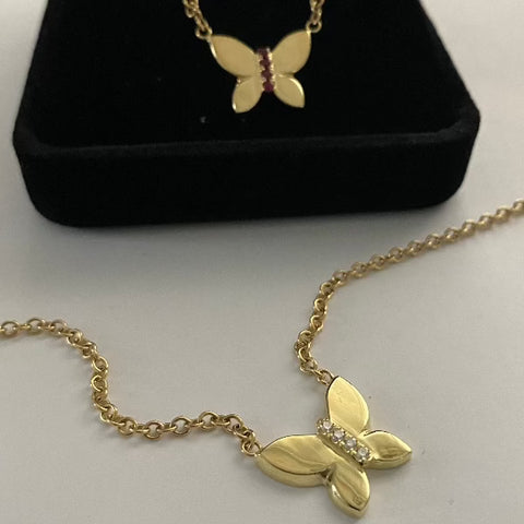 The JJ butterfly necklace made by hand in solid  18K gold and diamonds